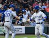 Blue Jays catcher Russell Martin, right, is greeted by teammate Josh Donaldson after hitting a home run against the White Sox in a Major League Baseball game on July 31, 2017, in Chicago. (AP Photo/David Banks)