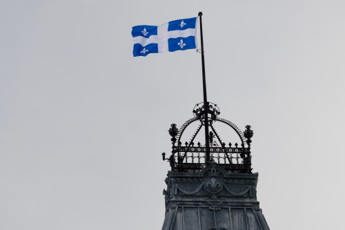 The Quebec Fleur-de-lis provincial flag flies on top of the National Assembly’s main tower, Wednesday, Jan. 18, 2023 in Quebec City. The Fleur-de-lis will celebrate its 75th anniversary on Saturday. THE CANADIAN PRESS/Jacques Boissinot