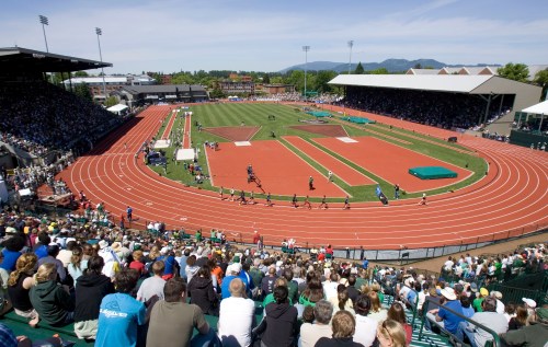 FILE - Distance runners round the track at Hayward Field during the Prefontaine Classic track and field meet in Eugene, Ore., June 8, 2008. (AP Photo/Don Ryan, file)