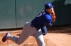 Los Angeles Dodgers' Shohei Ohtani takes part in a bullpen session before a baseball game against the Colorado Rockies Tuesday, Aug. 18, 2026, in Denver. (AP Photo/David Zalubowski)