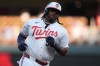 Minnesota Twins' Josh Bell runs the bases after hitting a two-run home run during the first inning of a baseball game against the Atlanta Braves Tuesday, Aug. 18, 2026, in Minneapolis. (AP Photo/Abbie Parr)