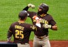 San Diego Padres' Fernando Tatis Jr. celebrates with Ty France (25) after hitting a home run against the New York Mets during the first inning of a baseball game, Tuesday, Aug. 18, 2026, in New York. (AP Photo/Noah K. Murray)