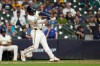 Milwaukee Brewers' Luis Lara hits a three-run home run for his first career home run during the eighth inning of a baseball game against the Seattle Mariners, Tuesday, Aug. 18, 2026, in Milwaukee. (AP Photo/Aaron Gash)