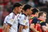Bayern's Jamal Musiala, second left, leaves the field during a friendly soccer match between FC Heidenheim and FC Bayern Munich in Heidenheim, Germany, Tuesday, Aug. 18, 2026. (Harry Langer/Defdol/dpa via AP)