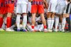 Bayern's Jamal Musiala, center, sits on the ground during a friendly soccer match between FC Heidenheim and FC Bayern Munich in Heidenheim, Germany, Tuesday, Aug. 18, 2026. (Harry Langer/Defdol/dpa via AP)