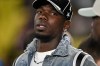 FILE - Monaco's Paul Pogba stands on the touchline as players warm-up before a Champions League opening phase soccer match between Monaco and Tottenham Hotspur in Monaco, Wednesday, Oct. 22, 2025. (AP Photo/Philippe Magoni, file)