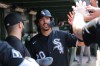 Chicago White Sox's Miguel Vargas celebrates in the dugout after scoring on Braden Montgomery's two-run double during the eighth inning of a baseball game against the Chicago Cubs, Wednesday, Aug. 19, 2026, in Chicago. (AP Photo/Melissa Tamez)