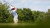 Scottie Scheffler hits from the 12th tee during the final round of the St. Jude Championship golf tournament, Sunday, Aug. 16, 2026, in Memphis, Tenn. (AP Photo/George Walker IV)