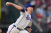 Texas Rangers starting pitcher Jacob deGrom throws during the first inning of a baseball game against the Baltimore Orioles, Saturday, Aug. 8, 2026, in Arlington, Texas. (AP Photo/LM Otero)