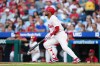 Philadelphia Phillies' Luis Arraez watches his two-run home run off Miami Marlins pitcher Sandy Alcantara during the third inning of a baseball game, Wednesday, Aug. 19, 2026, in Philadelphia. (AP Photo/Derik Hamilton)