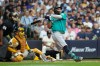 Seattle Mariners' Josh Naylor hits a two-run single during the second inning of a baseball game against the Milwaukee Brewers, Wednesday, Aug. 19, 2026, in Milwaukee. (AP Photo/Aaron Gash)