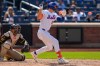 New York Mets' Jared Young hits an RBI single during the eighth inning of a baseball game against the San Diego Padres, Wednesday, Aug. 19, 2026, in New York. (AP Photo/Yuki Iwamura)