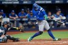 Toronto Blue Jays' George Springer connects for a two-run single off Tampa Bay Rays pitcher Casey Legumina during the seventh inning of a baseball game Thursday, Aug. 20, 2026, in St. Petersburg, Fla. (AP Photo/Chris O'Meara)