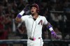Arizona Diamondbacks' Ketel Marte reacts after hitting a two-run home run against the Los Angeles Dodgers in the first inning of a baseball game, Sunday, Aug 9, 2026, in Phoenix. (AP Photo/Rick Scuteri)
