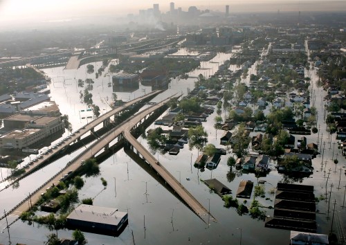 FILE - Floodwaters from Hurricane Katrina fill the streets near downtown New Orleans on Aug. 30, 2005. (AP Photo/David J. Phillip, File)