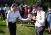 Canada's Brooke Henderson, of Smiths Falls, Ont., gives a signed golf ball to a spectator that was struck by her tee shot on the eighth hole during the second round at the LPGA CPKC Canadian Women's Open golf tournament, in Edmonton, on Friday, Aug. 21, 2026. THE CANADIAN PRESS/Darryl Dyck