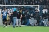 SV Mannheim supporters storm the field during the Germany Cup soccer match between SV Waldhof Mannheim and 1. FC Kaiserslautern, Friday, Aug. 21, 2026, in Mannheim, Germany. (Uwe Anspach/dpa via AP)