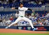 Miami Marlins pitcher Eury Pérez throws the ball during the first inning of a baseball game against the Washington Nationals, Saturday, August 22, 2026, in Miami. (AP Photo/Michael Laughlin)