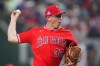 Los Angeles Angels starting pitcher Ryan Johnson throws during the first inning of a baseball game against the Texas Rangers, Saturday, Aug. 22, 2026, in Arlington, Texas. (AP Photo/LM Otero)