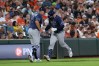 Tampa Bay Rays' Liam Hicks, right, is greeted by third base coach Brady Williams (4) as he runs the bases after hitting a home run off Baltimore Orioles pitcher Brandon Young during the second inning of baseball game in Baltimore, Saturday, Aug. 22, 2026. (AP Photo/Terrance Williams)