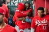 Cincinnati Reds' Elly De La Cruz, center right, hugs JJ Bleday, after Bleday hit for the cycle during the sixth inning of a baseball game against the Arizona Diamondbacks, Saturday, Aug. 22, 2026, in Phoenix. (AP Photo/Darryl Webb)