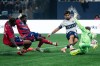 Vancouver Whitecaps' Brian White (24) scores on FC Dallas goalkeeper Jonathan Sirois (40) as FC Dallas' Sebastien Ibeagha, left, and Lalas Abubakar (5) defend during the first half of an MLS match in Vancouver, on Saturday, Aug. 22, 2026. THE CANADIAN PRESS/Ethan Cairns