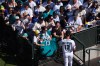 Seattle Mariners starting pitcher Kade Anderson signs autographs in the bullpen before making his major league debut against the Chicago Cubs in a baseball game, Saturday, Aug. 22, 2026, in Seattle. (AP Photo/Lindsey Wasson)