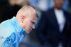 Manchester City's Erling Haaland warms up prior to the English Premier League soccer match between Manchester City and Bournemouth in Manchester, England, Sunday, Aug. 23, 2026. (AP Photo/Dave Thompson)