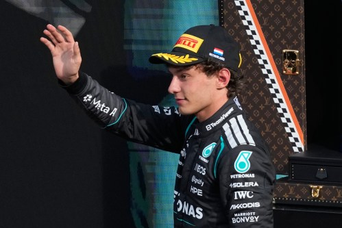 Mercedes driver Andrea Kimi Antonelli of Italy waves for the podium after taking the seond place at the Formula One Dutch Grand Prix in Zandvoort , Netherlands, Sunday, Aug. 23, 2026. (AP Photo/Darko Bandic)