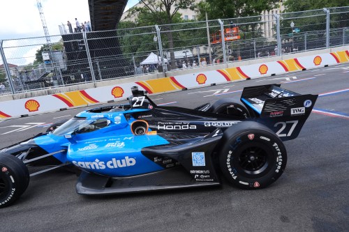 Kyle Kirkwood (27) makes a pit stop for gas during the IndyCar Freedom 250 Grand Prix auto race in Washington, Sunday, Aug. 23, 2026. (AP Photo/Alex Brandon)