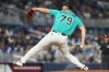 Miami Marlins relief pitcher Jack Ralston (79) throws during the seventh inning of a baseball game, making his MLB debut, against the Washington Nationals, Sunday, Aug. 23, 2026, in Miami. (AP Photo/Lynne Sladky)