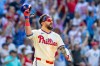 Philadelphia Phillies' Kyle Schwarber gestures after hitting the game winning home run in the ninth inning of a baseball game against the St. Louis Cardinals, Sunday, Aug. 23, 2026, in Philadelphia. (AP Photo/Laurence Kesterson)
