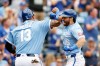Kansas City Royals' John Rave (16) celebrates after his two-run home run with Salvador Perez (13) during the fifth inning of a baseball game against the Detroit Tigers in Kansas City, Mo., Sunday, Aug. 23, 2026. (AP Photo/Colin E. Braley)