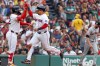 Boston Red Sox runner Mickey Gasper, cente, high fives with teammate Wilyer Abreu, left, after he scored in the fourth inning of a baseball game against the San Francisco Giants, Sunday Aug 23, 2026 in Boston. (AP Photo/Jim Davis)