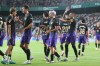 Barcelona's Fermin Lopez, left, celebrates after scoring his side's his fifth goal during a Spanish La Liga soccer match between Elche and Barcelona in Elche, Spain, Sunday, Aug. 23, 2026. (AP Photo/Alberto Saiz)