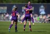 Calgary Wild's Ally Green, back right, Kahli Johnson (15) and Jenaya Robertson (16) celebrate Johnson's goal against Vancouver Rise during the first half of an NSL soccer match, in Burnaby, B.C., on Saturday, May 24, 2025. THE CANADIAN PRESS/Darryl Dyck