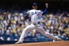 Los Angeles Dodgers starting pitcher Blake Snell throws during the first inning of a baseball game against the Pittsburgh Pirates, Sunday, Aug. 23, 2026, in Los Angeles. (AP Photo/Ethan Swope)