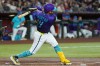 Arizona Diamondbacks' Gabriel Moreno breaks his bat on a swing during the first inning of a baseball game against the Cincinnati Reds, Sunday, Aug. 23, 2026, in Phoenix. (AP Photo/Ross D. Franklin)