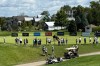 LIV Golf fans gather at the practice putting green before the final round of the season-ending event in suburban Indianapolis, Ind., Sunday, Aug. 23, 2026. (AP Photo/Michael Marot)