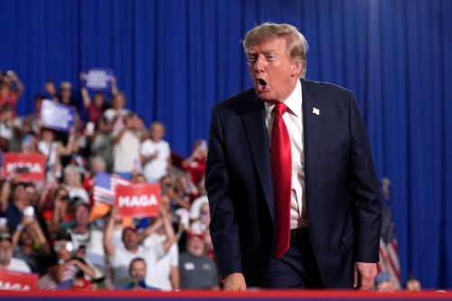 President Donald Trump addresses the crowd as he departs a campaign rally for Sen. Darline Graham, R-S.C., at the Myrtle Beach Convention Center in Myrtle Beach, S.C., Friday, Aug. 21, 2026. (AP Photo/Jacquelyn Martin)