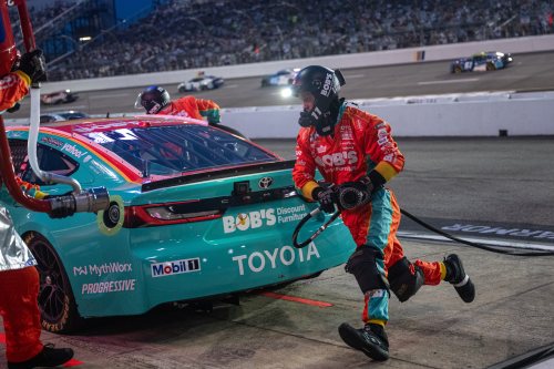 Joe Gibbs Racing driver Denny Hamlin (11) pit crew goes over the wall during Cook Out 400 at Richmond Raceway, Saturday, Aug. 15, 2026, in Richmond Va. (AP Photo/Robert Simmons)