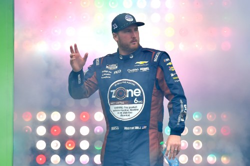 FILE - Austin Hill is introduced to the crowd before a NASCAR Cup Series auto race, Aug. 23, 2026, at New Hampshire Motor Speedway in Loudon, N.H. (AP Photo/Steven Senne, File)