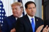 President Donald Trump walks past Secretary of State Marco Rubio as he arrives for a roundtable on the American mining industry, Friday, Aug. 7, 2026, at the State Department in Washington. (AP Photo/Julia Demaree Nikhinson)