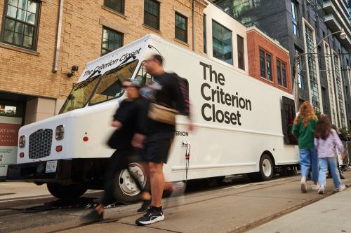 Festival-goers pass the Criterion Closet mobile video library during its stop at the Toronto International Film Festival in Toronto, on Sunday, Sept. 7, 2025. THE CANADIAN PRESS/Sammy Kogan