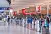 Travellers are seen at U.S. Departures at Montreal-Pierre Elliott Trudeau International Airport in Montreal on Wednesday, March 18, 2026. THE CANADIAN PRESS/Christinne Muschi