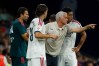 Real Madrid's head coach Jose Mourinho talks with his player Real Madrid's Jude Bellingham during a Spanish La Liga soccer match between Espanyol and Real Madrid in Barcelona, Spain, Saturday, Aug. 22, 2026. (AP Photo/Joan Monfort)
