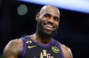 FILE - Los Angeles Lakers forward LeBron James reacts during the first half of an NBA basketball game against the Phoenix Suns, Friday, April 10, 2026, in Los Angeles. (AP Photo/Jessie Alcheh, File)