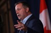 Alberta Premier Jason Kenney answers questions during a press conference in Victoria on July 12, 2022. THE CANADIAN PRESS/Chad Hipolito