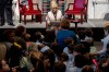 FILE - Dolly Parton reads her book 
