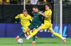 N.E.C. Nijmegen's Freek Entius, center, is challenged by Bodø/Glimt's Andreas Helmersen and Sondre Auklend, left, during the Champions League qualifying soccer match between Bodø/Glimt and NEC Nijmegen in Bodo, norway, Tuesday Aug. 25, 2026. (Mats Torbergsen/NTB via AP)